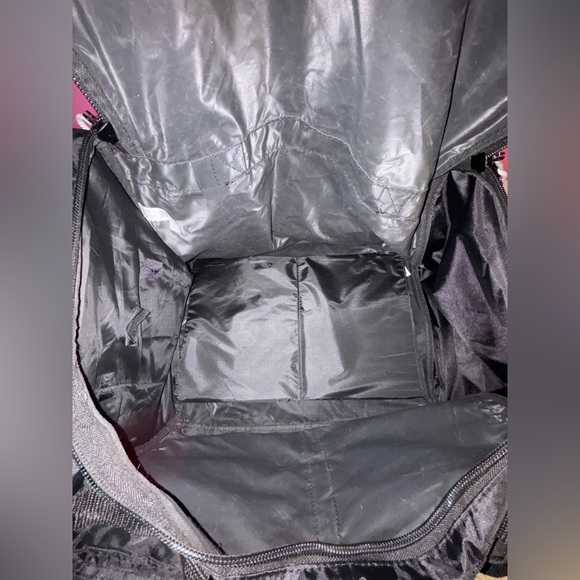 Black Duffel Bag with White Accents and Modern Design - Picture 11 of 13